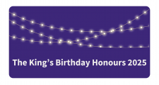 A line of party lights and the words, The King's Birthday Honours underneath.