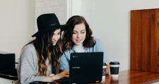 Young care leavers can access new help online Teenagers looking at a laptop
