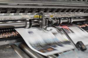 bank phrom tzm3oyu 6sk unsplash Image depicting newspaper presses