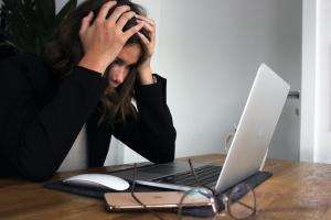 elisa ventur bmjaxaz6ads unsplash Image depicting the stress of filing your CPD on time