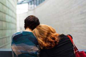 kulli kittus kqfxvdhgcug unsplash A child and parent wait for support