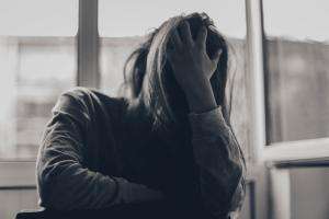 A child struggling with mental health Child in despair