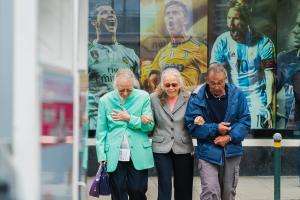 philippe leone y5vbtbgswlq unsplash Older people walking through a town